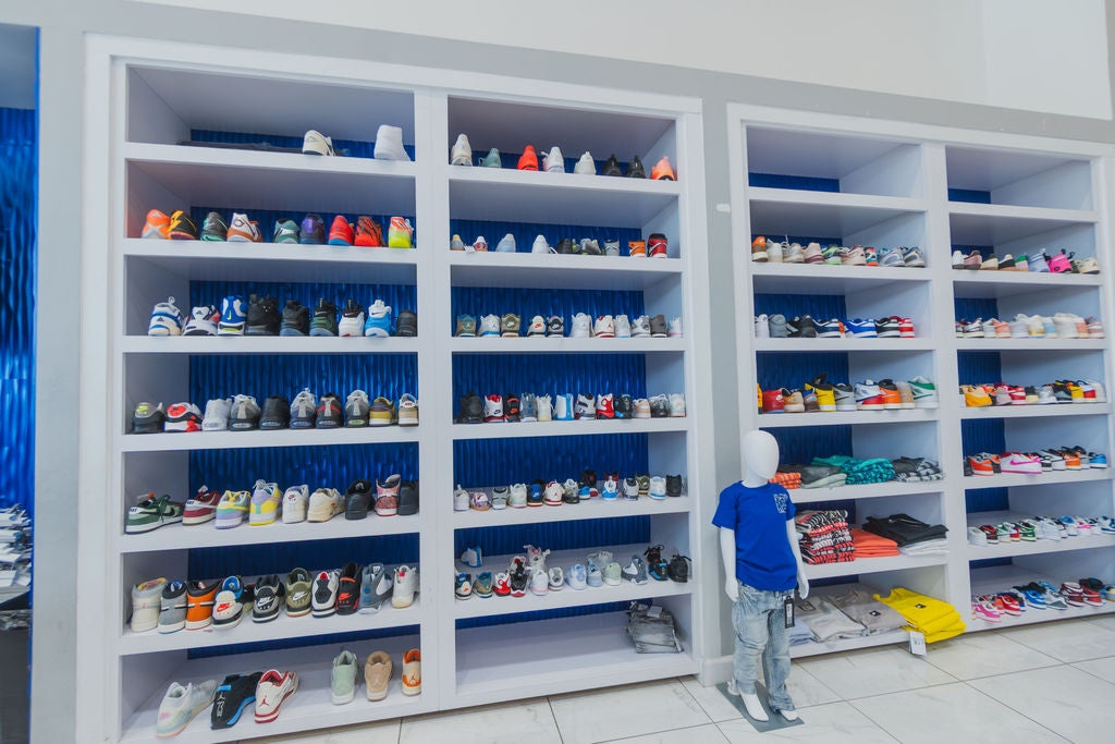 Sole Play Bama kids' shoe wall with mannequin
